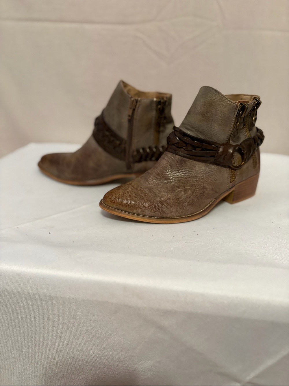 Boutique by Corky Chief ankle boots with a distressed finish and a braided strap